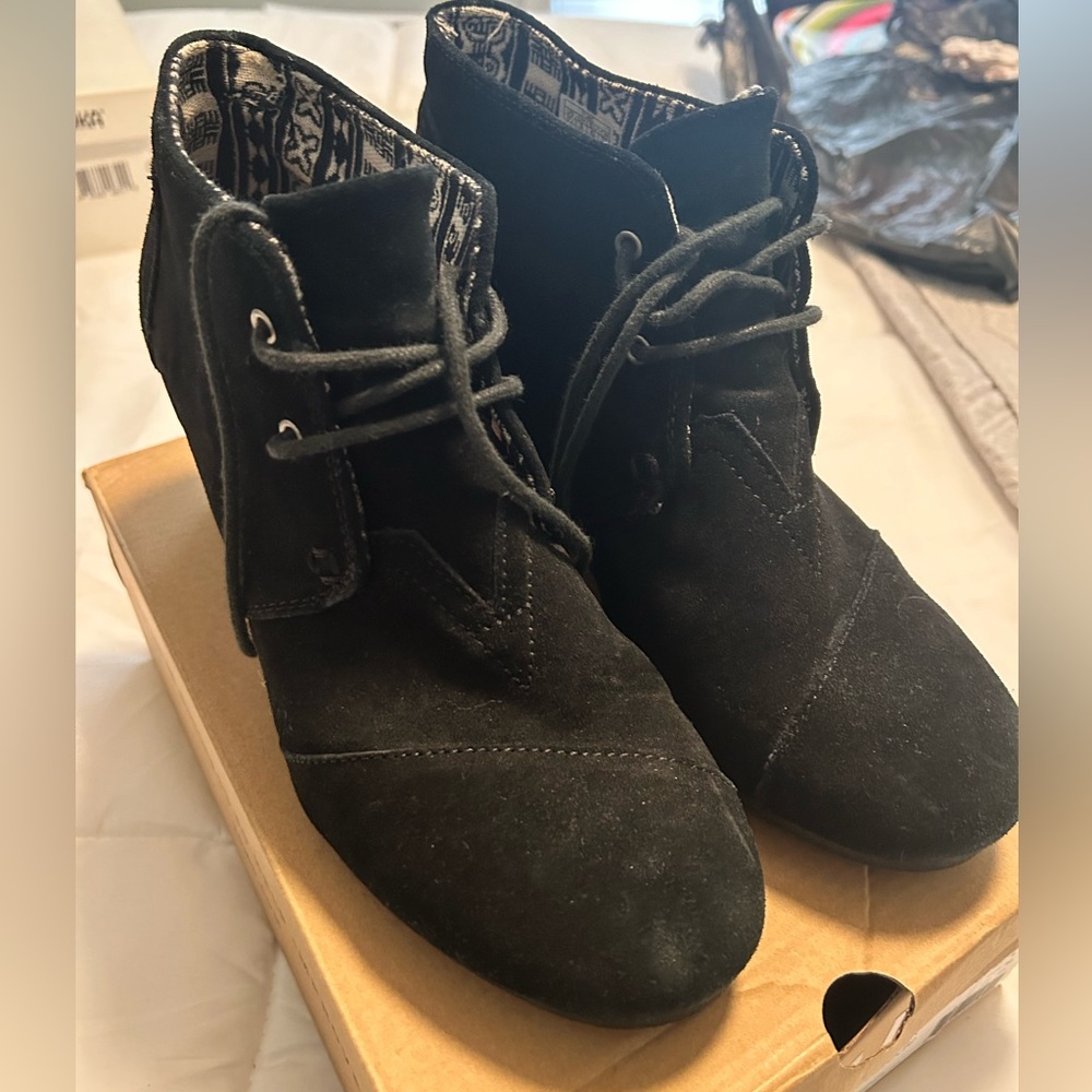 Black suede wedge TOMS lace up booties. Size 10